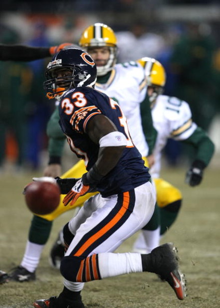 CHICAGO - DECEMBER 22: Charles Tillman #33 of the Chicago Bears and Mason Crosby #2 of the Green Bay Packers watch the ball bound away after Crosby had a field goal blocked with 18 seconds left in regulation time on December 22, 2008 at Soldier Field in C