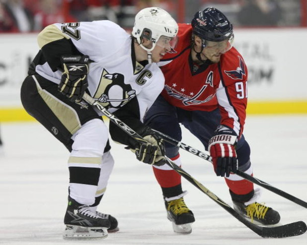 WASHINGTON - MAY 13: Sergei Fedorov #91 of the Washington Capitals skates against Sidney Crosby #87 of the Pittsburgh Penguins during Game Seven of the Eastern Conference Semifinal  Round of the 2009 Stanley Cup Playoffs at Verizon Center on May 13, 2009 