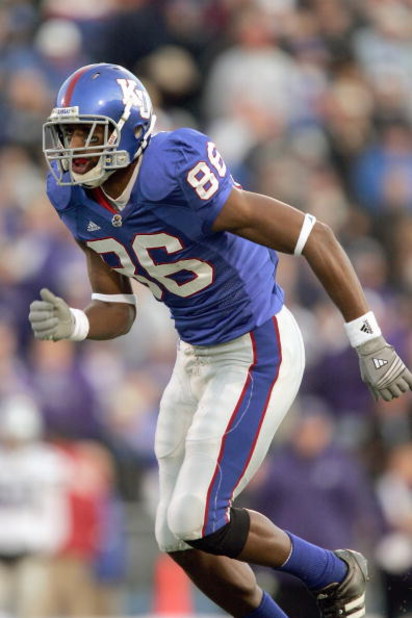 LAWRENCE, KS - NOVEMBER 18:  Marcus Henry #86 of the Kansas Jayhawks moves on the field during the game against the Kansas State Wildcats on November 18, 2006 at Memorial Stadium in Lawrence, Kansas.  Kansas won 39-20.  (Photo by Brian Bahr/Getty Images)