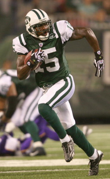 EAST RUTHERFORD, NJ - AUGUST 17:  Wallace Wright #15 of the New York Jets carries the ball against the Minnesota Vikings during their preseason game on August 17, 2007 at Giants Stadium in East Rutherford, New Jersey. The Jets won 31-16. (Photo by Nick La