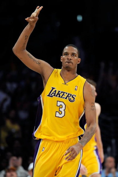 LOS ANGELES, CA - APRIL 21:  Trevor Ariza #3 of the Los Angeles Lakers reatcs to making of a three-pointer in the second quarter against the Utah Jazz in Game Two of the Western Conference Quarterfinals during the 2009 NBA Playoffs at Staples Center on Ap
