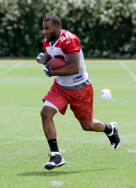TEMPE, AZ - MAY 2 :  Chris Wells #26 of the Arizona Cardinals runs during a team minicamp at the team training facility on May 2, 2009 in Tempe, Arizona.  (Photo by Jonathan Willey/Getty Images)