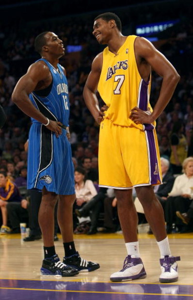 LOS ANGELES - JANUARY 16:  Andrew Bynum #17 of the Los Angeles Lakers and Dwight Howard #12 of the Orlando Magic look on during a break in their NBA game on January 16, 2009 at Staples Center in Los Angeles, California. The Magic won 109-103.   NOTE TO US