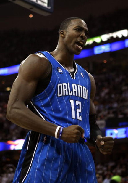 CLEVELAND - MAY 28:  Dwight Howard #12 of the Orlando Magic reacts after a play against the Cleveland Cavaliers in Game Five of the Eastern Conference Finals during the 2009 Playoffs at Quicken Loans Arena on May 28, 2009 in Cleveland, Ohio. NOTE TO USER: