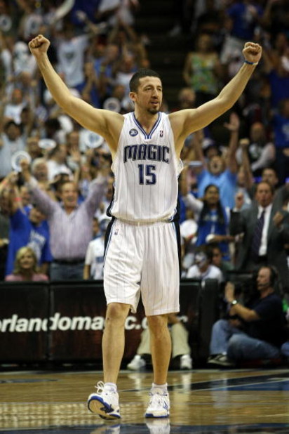 ORLANDO, FL - MAY 26:  Hedo Turkoglu #15 of the Orlando Magic celebrates a three point shot by teammate Rashard Lewis to take the lead 100-98 over the Cleveland Cavaliers in the fourth quarter of Game Four of the Eastern Conference Finals during the 2009 