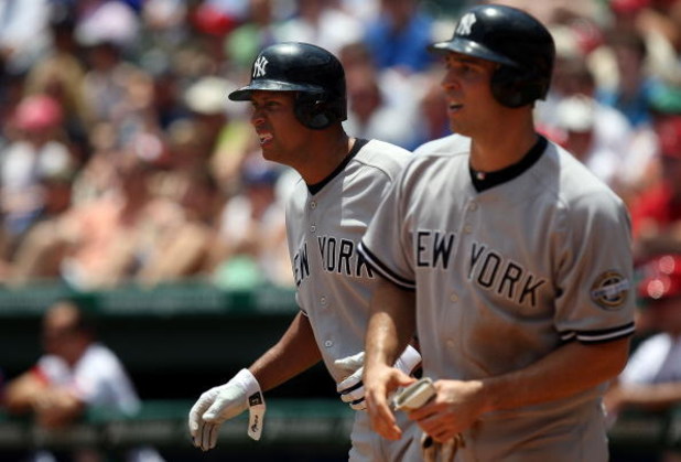 ARLINGTON, TX - MAY 25:  Alex Rodriguez and Mark Teixeira #25 of the New York Yankees celebrate after scoring against the Texas Rangers in the third inning on May 25, 2009 at Rangers Ballpark in Arlington, Texas.  (Photo by Ronald Martinez/Getty Images)