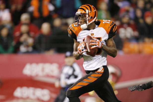 SAN FRANCISCO - DECEMBER 15:  Wide receiver Chris Henry #15 of the Cincinnati Bengals heads for the end zone after catching a 52-yard pass during a game against the San Francisco 49ers at Monster Park December 15, 2007 in San Francisco, California.  (Phot