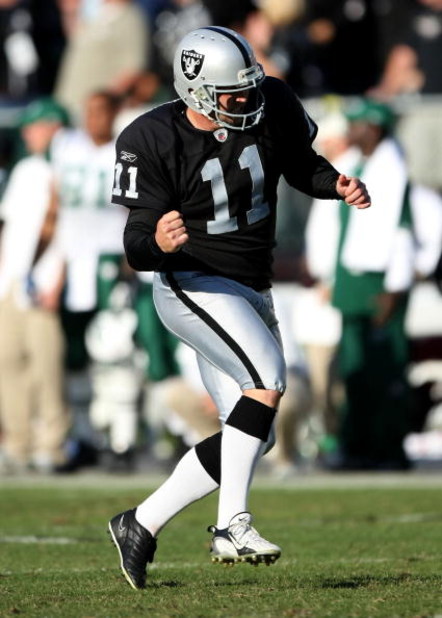 OAKLAND, CA - OCTOBER 19:  Sebastian Janikowski #11 of the Oakland Raiders celebrates after kicking a 57 yard field goal in overtime against the New York Jets during an NFL game on October 19, 2008 at the Oakland-Alameda County Coliseum in Oakland, Califo