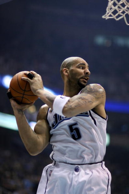 SALT LAKE CITY - APRIL 25: Carlos Boozer #5 of the Utah Jazz comes down with a rebound in Game Four of the Western Conference Quarterfinals against the Los Angeles Lakers during the 2009 NBA Playoffs at Energy Solutions Arena on April 25, 2009 in Salt La