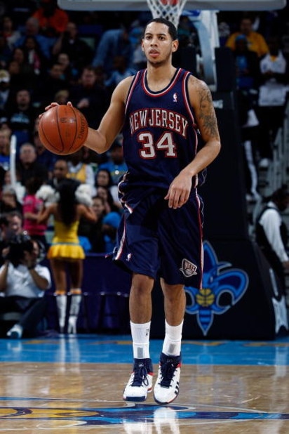 NEW ORLEANS - JANUARY 21: Devin Harris #34 of the New Jersey Nets dribbles against the New Orleans Hornets on January 21, 2009 at the New Orleans Arena in New Orleans, Louisiana. The Hornets defeated the Nets 102-92. NOTE TO USER: User expressly acknow