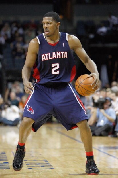 CHARLOTTE, NC - MARCH 6: Joe Johnson #2 of the Atlanta Hawks dribbles the ball against the Charlotte Bobcats during their game at Time Warner Cable Arena on March 6, 2009 in Charlotte, North Carolina. NOTE TO USER: User expressly acknowledges and agrees