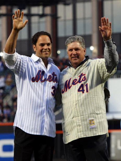 NEW YORK - APRIL 13:  Former Mets players Mike Piazza and Tom Seaver greet fans before throwing out the first pitch of the San Diego Padres against the New York Mets during opening day at Citi Field on April 13, 2009 in the Flushing neighborhood of the Qu