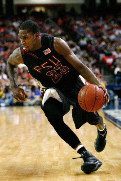ATLANTA - MARCH 15:  Toney Douglas #23 of the Florida State Seminoles dribbles against the Duke Blue Devils during the championship game of the 2009 ACC Men's Basketball Tournament on March 15, 2009 at the Georgia Dome in Atlanta, Georgia.  (Photo by Kevi
