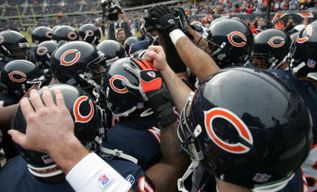 CHICAGO - DECEMBER 17:  The Chicago Bears hudle up in the endzone prior to the start of their game against the Tampa Bay Buccaneers December 17, 2006 at Soldier Field in Chicago, Illinois. The Bears won 34-31 in overtime. (Photo by Jonathan Daniel/Getty I