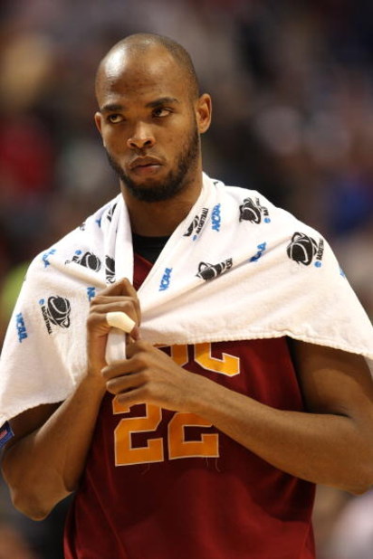 MINNEAPOLIS - MARCH 22:  Taj Gibson #22 of the USC Trojans walks off the court dejected after USC lost 74-69 against the Michigan State Spartans during the second round of the NCAA Division I Men's Basketball Tournament at the Hubert H. Humphrey Metrodome