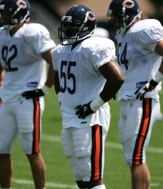 BOURBONNAIS, IL - JULY 30: (L-R) Linebackers Hunter Hillenmeyer #92, Lance Briggs #55 and Brian Urlacher #54 of the Chicago Bears prepare for a play during a summer training camp practice on July 30, 2007 at Olivet Nazarene University in Bourbonnais, Illi