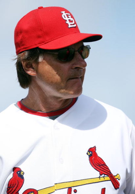 JUPITER, FL - FEBRUARY 25:  Manager Tony La Russa #10 of the St. Louis Cardinals watches his pitcher warm up before taking on the Florida Marlins during a spring training game at Roger Dean Stadium February 25, 2009 in Jupiter, Florida.  (Photo by Doug Be
