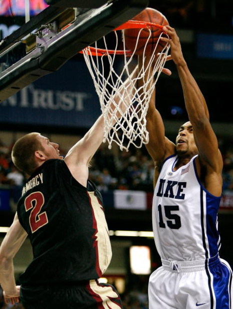 ATLANTA - MARCH 15:  Gerald Henderson #15 of the Duke Blue Devils draws a foul while dunking against Jordan DeMercy #2 of the Florida State Seminoles during the championship game of the 2009 ACC Men's Basketball Tournament at the Georgia Dome March 15, 20
