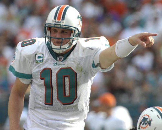 MIAMI, FL - JANUARY 4:  Quarterback Chad Pennington #10 of the Miami Dolphins directs play against the Baltimore Ravens in an NFL Wildcard Playoff Game at Dolphins Stadium on January 4, 2009 in Miami, Florida.  (Photo by Al Messerschmidt/Getty Images) 