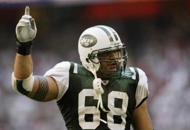 HOUSTON -  OCTOBER 19:  Kevin Mawae #68  of the New York Jets signals before game play against the Houston Texans at Reliant Stadium on October 19, 2003 in Houston, Texas. The Jets defeated the Texans 19-14.  (Photo by Ronald Martinez/Getty Images)
