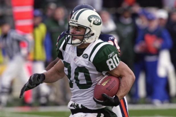 CHAMPAIGN, IL - DECEMBER 15:  Wide receiver Wayne Chrebet #80 of the New York Jets runs the ball against the Chicago Bears during their NFL game on December 15, 2002 at Memorial Stadium at the University of Illinois in Champaign, Illinois.  The Bears defe