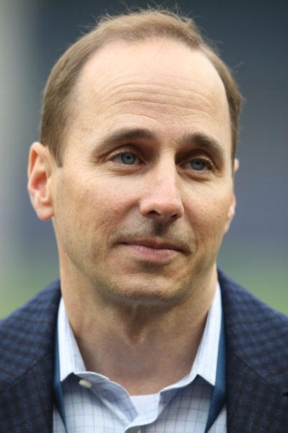 NEW YORK - APRIL 21:  General Manager of the New York Yankees, Brian Cashman on the field prior to the game against the Oakland Athletics on April 21, 2009 at Yankee Stadium in the Bronx borough of New York City.  (Photo by Nick Laham/Getty Images)