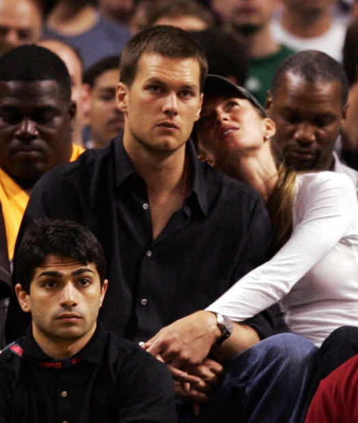 BOSTON - MAY 22:  Tom Brady of the New England Patriots and Giselle Bundchen watch as the Detroit Pistons play against the Boston Celtics during Game Two of the 2008 NBA Eastern Conference finals at the TD Banknorth Garden on May 22, 2008 in Boston, Massa