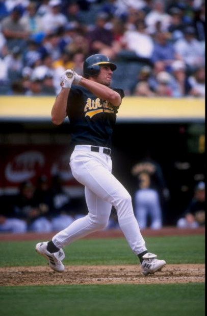 30 Jun 1998:  Outfielder Ben Grieve #14 of the Oakland Athletics in action during an interleague game against the San Diego Padres at Oakland Coliseum in Oakland, California.  The Athletics won the game, 12-10. Mandatory Credit: Otto Greule Jr.  /Allsport