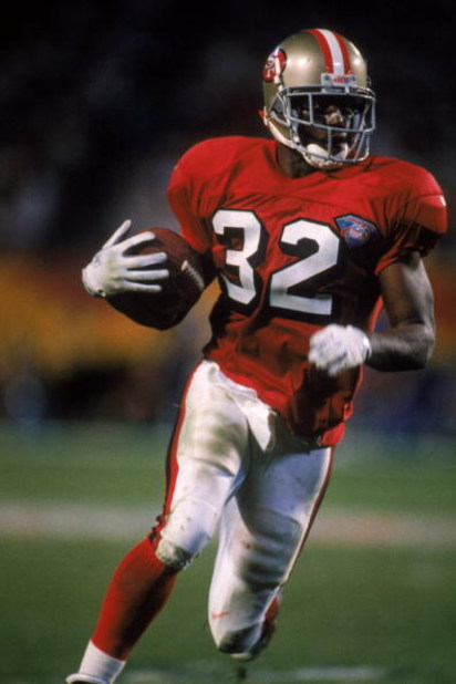 MIAMI - JANUARY 29:  Running back Ricky Watters #32 of the San Francisco 49ers runs with the ball during Super Bowl XXIX against the San Diego Chargers at Joe Robbie Stadium on January 29, 1995 in Miami, Florida. The 49ers won 49-26. (Photo by George Rose