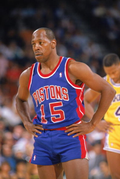 LOS ANGELES - 1989:  Vinnie Johnson #15 of the Detroit Pistons looks on during a game against the Los Angeles Lakers at the Great Western Forum in Los Angeles, California in 1988-1989 NBA season.  (Photo by Mike Powell /Getty Images)