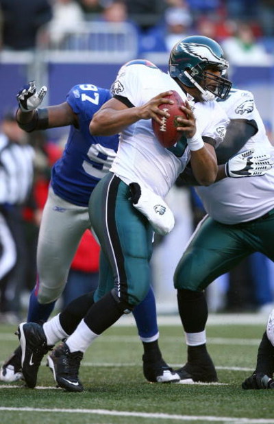 EAST RUTHERFORD, NJ - JANUARY 11:  Quarterback Donovan McNabb #5 of the Philadelphia Eagles scrambles in the pocket during the NFC Divisional Playoff Game against the New York Giants on January 11, 2009 at Giants Stadium in East Rutherford, New Jersey.  T