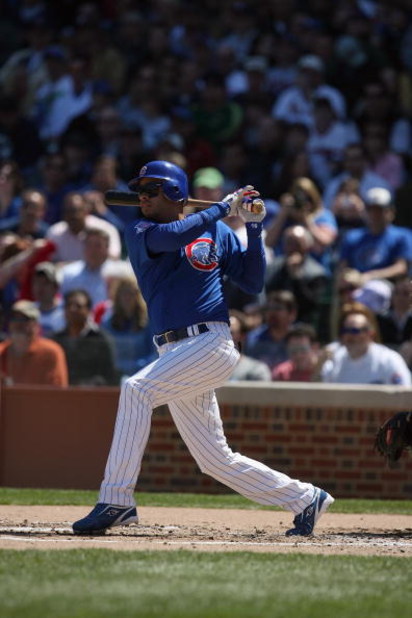 CHICAGO - APRIL 17:  Aramis Ramirez #16 of the Chicago Cubs bats against the St. Louis Cardinals on April 17, 2009 at Wrigley Field in Chicago, Illinois. (Photo by Jonathan Daniel/Getty Images) 