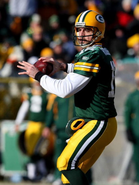 GREEN BAY, WI - DECEMBER 28: Aaron Rodgers #12 of the Green Bay Packers looks for a receiver against the Detroit Lions on December 28, 2008 at Lambeau Field in Green Bay, Wisconsin. The Packers defeated the Lions 31-21. (Photo by Jonathan Daniel/Getty Ima
