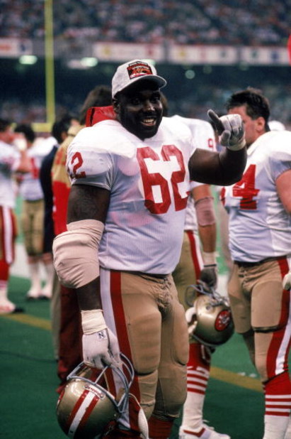 NEW ORLEANS - JANUARY 28:  Guy McIntyre #62 of the San Francisco 49ers celebrates on the sidelines in Super Bowl XXIV against the Denver Broncos at Louisiana Superdome on January 28, 1990 in New Orleans, Louisiana.  The 49ers won 55-10.  (Photo by George 