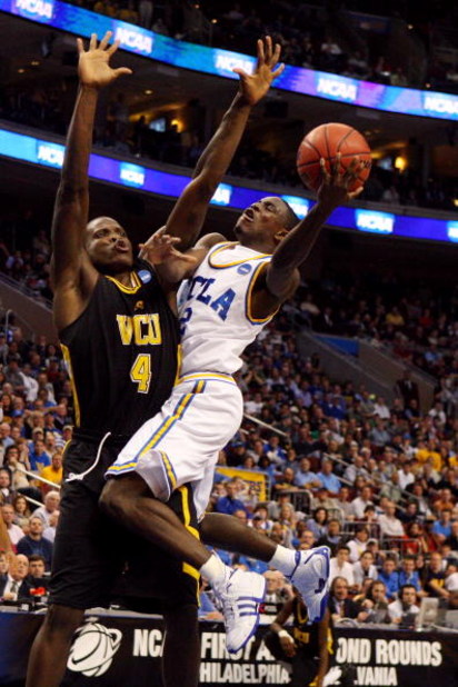 PHILADELPHIA - MARCH 19:  Darren Collison #2 of the UCLA Bruins shoots against Terrance Saintil #4 of the VCU Rams during the first round of the NCAA Division I Men's Basketball Tournament at the Wachovia Center on March 19, 2009 in Philadelphia, Pennsylv