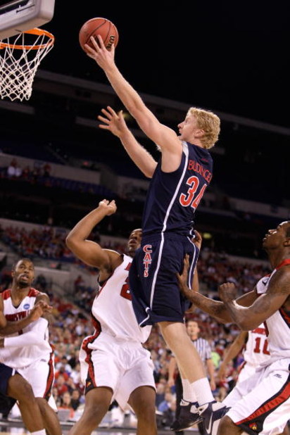 INDIANAPOLIS - MARCH 27:  Chase Budinger #34 of the Arizona Wildcats attempts a shot against the Louisville Cardinals  during the third round of the NCAA Division I Men's Basketball Tournament at the Lucas Oil Stadium on March 27, 2009 in Indianapolis, In