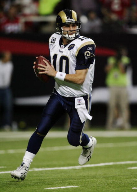 ATLANTA - DECEMBER 28:  Quarterback Marc Bulger #10 of the St. Louis Rams rolls out to pass against the Atlanta Falcons at Georgia Dome on December 28, 2008 in Atlanta, Georgia.  (Photo by Doug Benc/Getty Images)