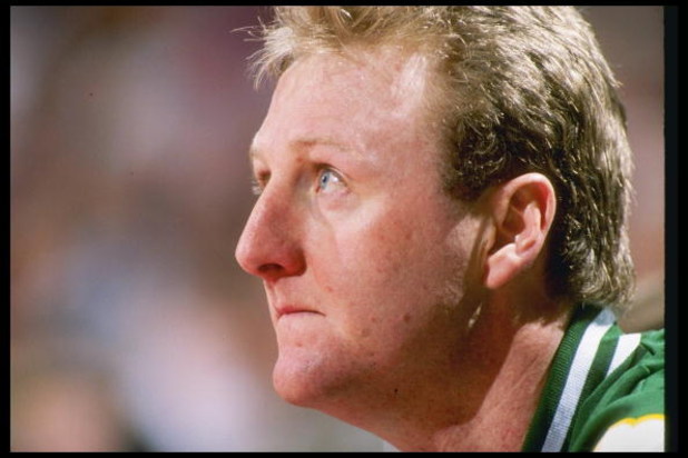 DENVER - 1990:  Boston Celtics forward Larry Bird #33 looks on from the bench during game against the Denver Nuggets at McNichols Arena in Denver, Colorado. (Photo by Allsport  /Allsport