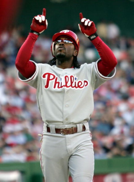 WASHINGTON - APRIL 27:  Jimmy Rollins #11 of the Philadelphia Phillies celebrates as he crosses the plate after hitting a solo home run in the ninth inning off starting pitcher Esteban Loaiza #21 of the Washington Nationals at RFK Stadium on April 27, 200