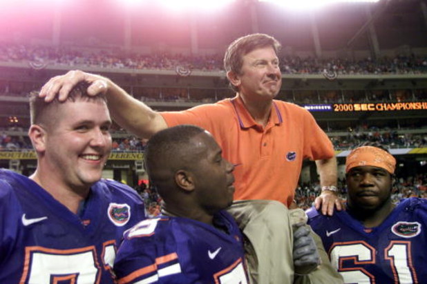 2 Dec 2000:  Head coach Steve Spurrier of the Florida Gators is carried off the field by players following the Gators'' 28-6 victory over Auburn to win the Southeastern Conference (SEC) Championship at the Georgia Dome in Atlanta, Georgia.  DIGITAL IMAGE 
