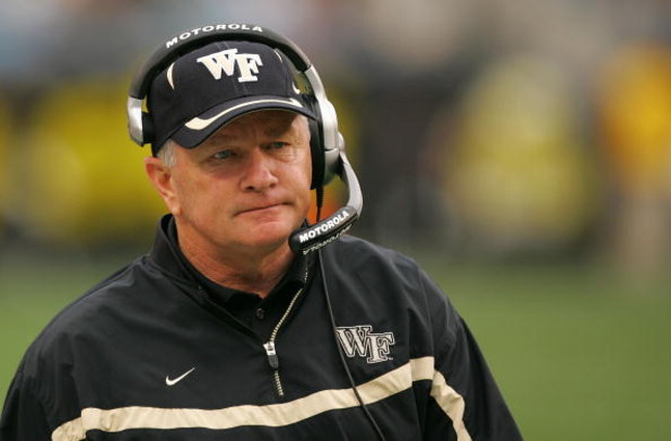 CHARLOTTE, NC - DECEMBER 29:  Head coach Jim Grobe of the Wake Forest Demon Deacons watches on during their game against the Connecticut Huskies at Bank of America Stadium on December 29, 2007 in Charlotte, North Carolina.  (Photo by Streeter Lecka/Getty 