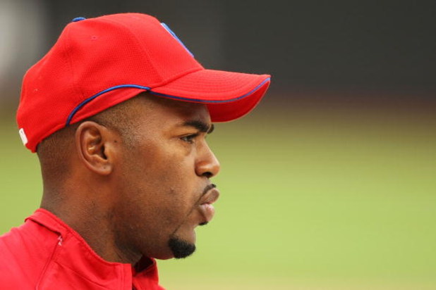NEW YORK - JUNE 10:  Jimmy Rollins #11 of the Philadelphia Phillies looks on during batting practice before the game against the New York Mets on June 10, 2009 at Citi Field in the Flushing neighborhood of the Queens borough of New York City.  (Photo by A