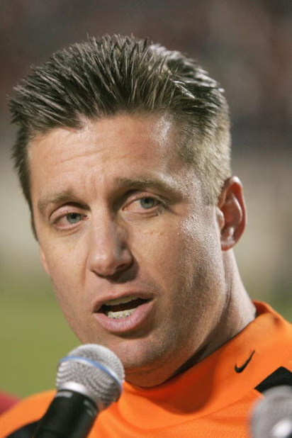 SHREVEPORT, LA - DECEMBER 28: Head coach Mike Gundy of Oklahoma State talks to the crowd after winning the PetroSun Independence Bow against Alabama on December 28, 2006 at Independence Stadium in Shreveport, Louisiana. (Photo by Chris Graythen/Getty Imag