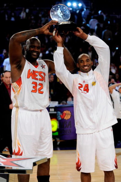 PHOENIX - FEBRUARY 15:  Co-MVPs Shaquille O'Neal #32 and Kobe Bryant #24 of the Western Conference hold up the trophy after the Western Conference defeated the Eastern Conference in the 58th NBA All-Star Game, part of 2009 NBA All-Star Weekend at US Airwa