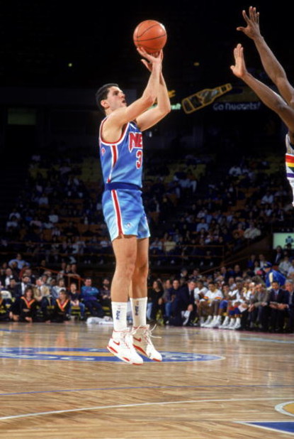 DENVER - 1990-91:  Drazen Petrovic #3 of the New Jersey Nets shoots a jumper against the Denver Nuggets during a 1990-91 season game at McNichols Arena in Denver, Colorado. NOTE TO USER: User expressly acknowledges and agress that, by downloading and or u