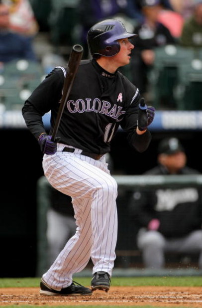 DENVER - MAY 10:  Brad Hawpe #11 of the Colorado Rockies takes an at bat against the Florida Marlins during MLB action at Coors Field on May 10, 2009 in Denver, Colorado. The Rockies defeated the Marlins 3-2.  (Photo by Doug Pensinger/Getty Images)