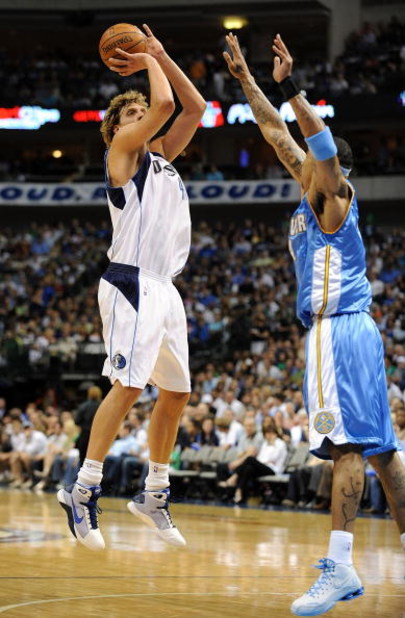 DALLAS - MAY 09:  Forward Dirk Nowitzki #41 of the Dallas Mavericks takes a shot against Kenyon Martin #4 of the Denver Nuggets in Game Three of the Western Conference Semifinals during the 2009 NBA Playoffs at American Airlines Center on May 9, 2009 in D