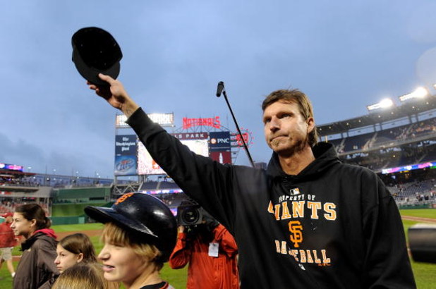 WASHINGTON - JUNE 04:  Randy Johnson #51 of the San Francisco Giants tips his hat to the crowd after winning his 300th career game against the Washington Nationals at Nationals Park on June 4, 2009 in Washington, DC.  The Giants won the game 5-1.  (Photo 