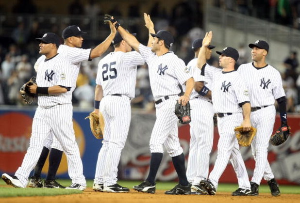 NEW YORK - JUNE 08: The New York Yankees celebrate defeating the Tampa Bay Rays on June 8, 2009 at Yankee Stadium in the Bronx borough of New York City.  (Photo by Nick Laham/Getty Images)