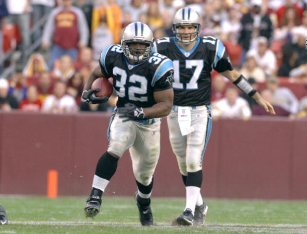 Carolina Panthers  running back Eric Shelton takes a handoff from quarterback Jake Delhomme against the Washington Redskins Nov. 26, 2006 at FedEx Field in Washington.  (Photo by Al Messerschmidt/Getty Images)